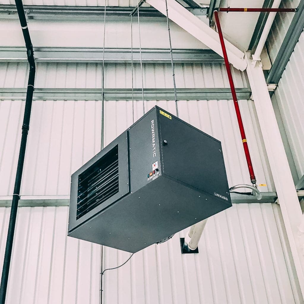 Gas unit heater installed in a warehouse