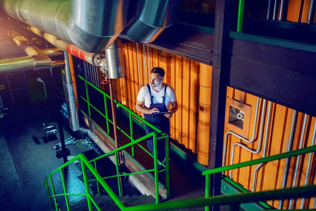 A facility manager walking around his facility to make sure everything is in check.