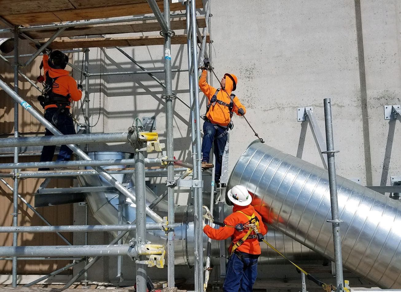Workers on a Makeup Air Unit