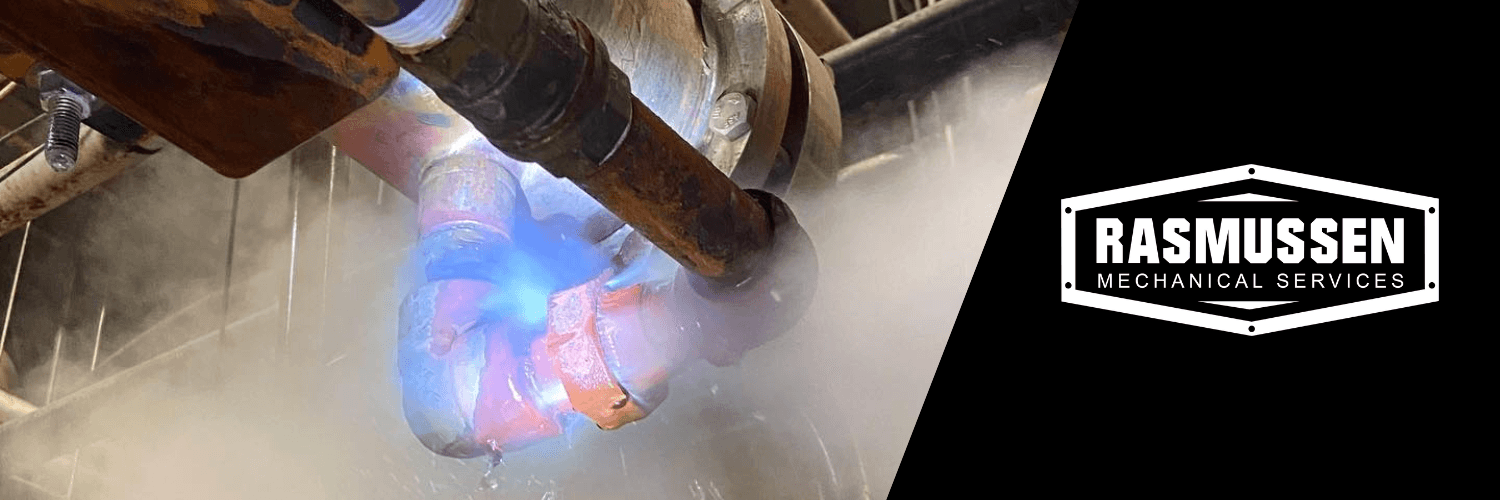 Steam Pipe Leaking With Rasmussen Mechanical Logo