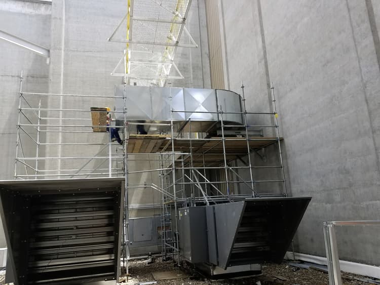 Installing HVAC outside of facility on scaffolding to make-up air units 2