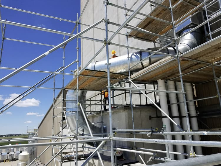 Installing HVAC outside of facility on scaffolding 2