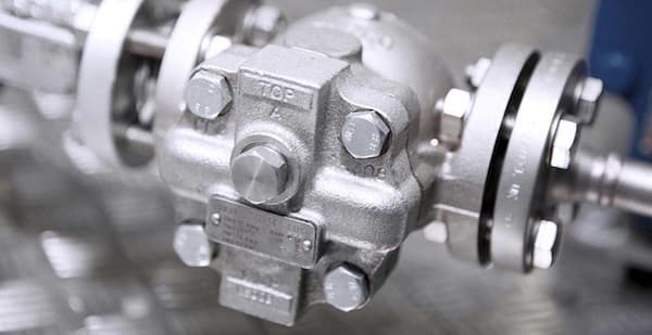Close up of a steam trap and it's components.