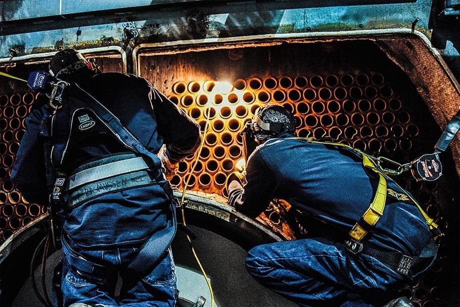 Two Technicians making boiler repairs. Part of our commercial boiler program.