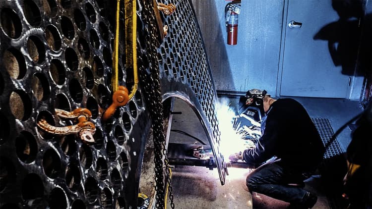 Technician performing commercial Boiler Repair Welding