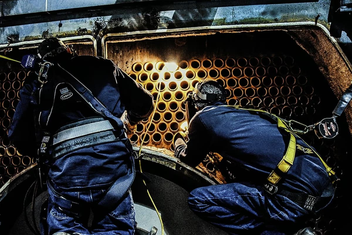 Two Technicians making boiler repairs. Part of our commercial boiler program.
