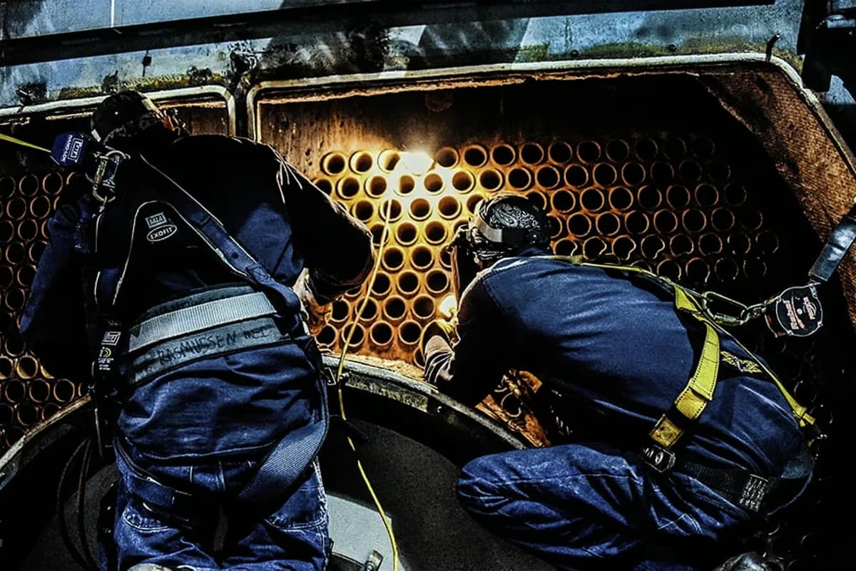 Two Technicians making boiler repairs. Part of our commercial boiler program.