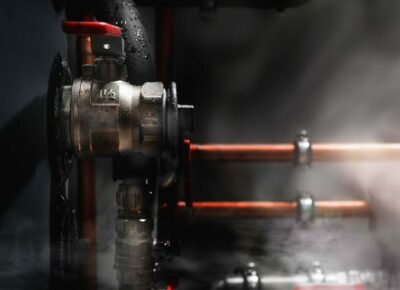 Boiler Efficiency Tips and Tricks: What Do You Need to Know to Save Money? | RasMech Steam coming out of a boiler's pipes.