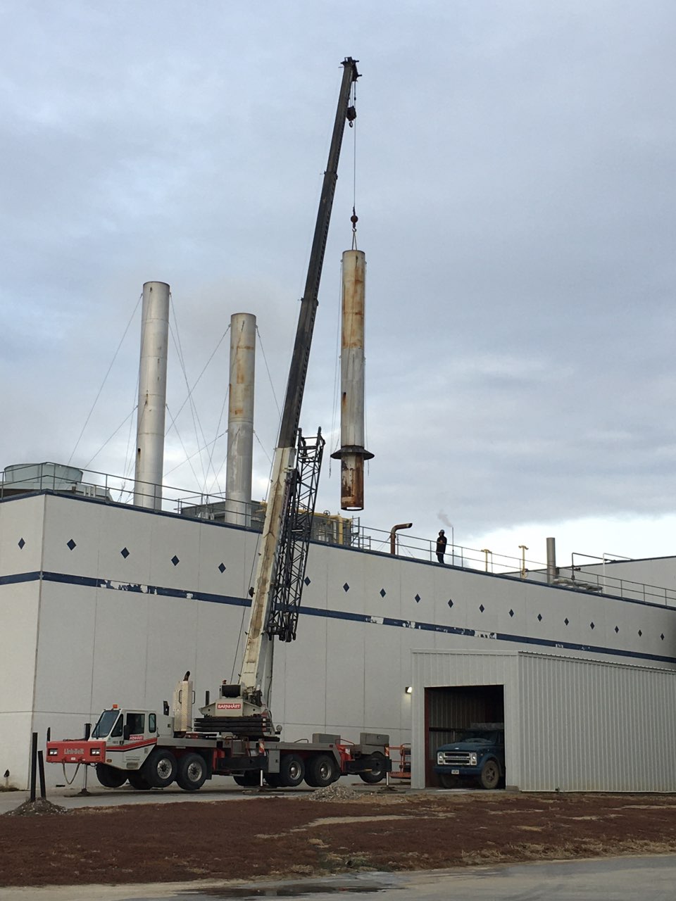 Stack from boiler being pulled for economizer install